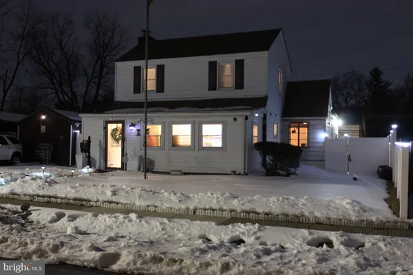 a car parked in front of a house