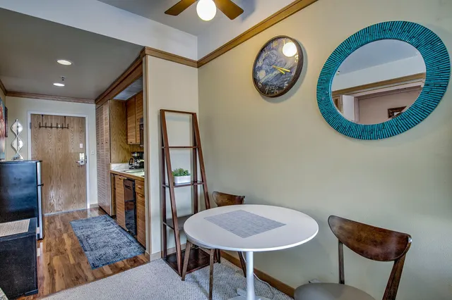 a kitchen with a sink and a microwave