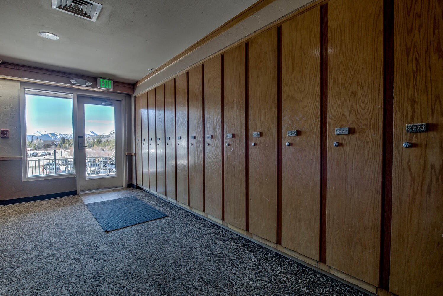 1211 West Keystone Road, Unit 2757 Keystone, CO 80435 - Photo 35 of 46 a view of an empty room with windows and gate