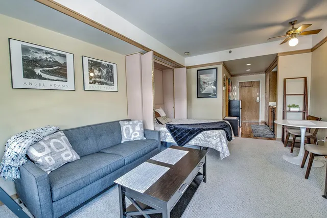 a living room with furniture and a couch