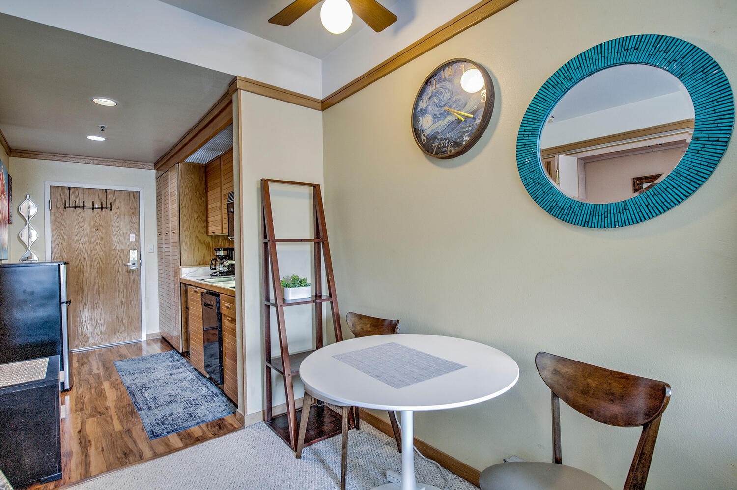 1211 West Keystone Road, Unit 2757 Keystone, CO 80435 - Photo 10 of 46 a view of a hallway with entryway wooden floor and a dining table