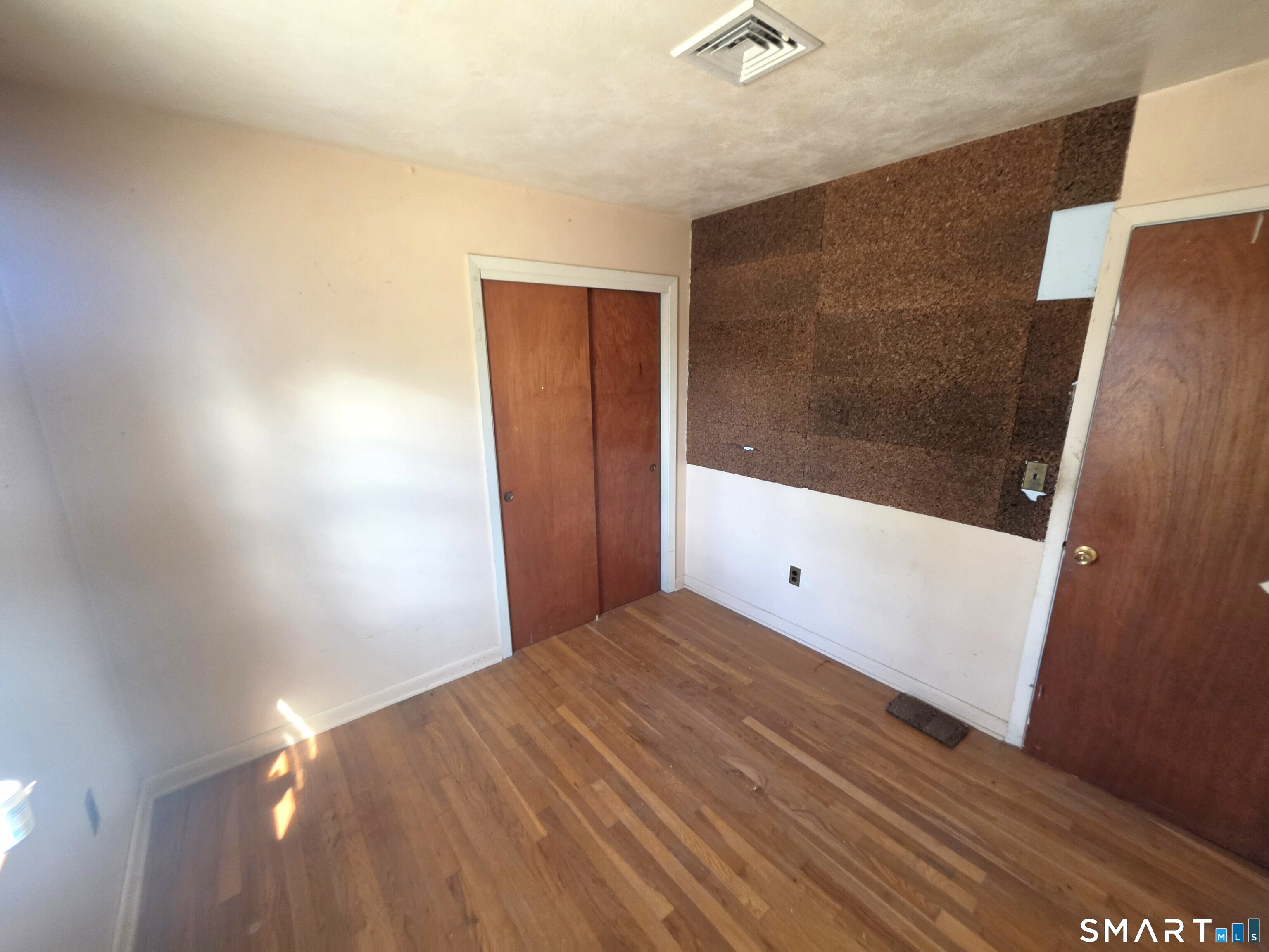 12 Brentwood Road New Milford, CT 06776 - Photo 16 of 21 a view of an empty room with a window