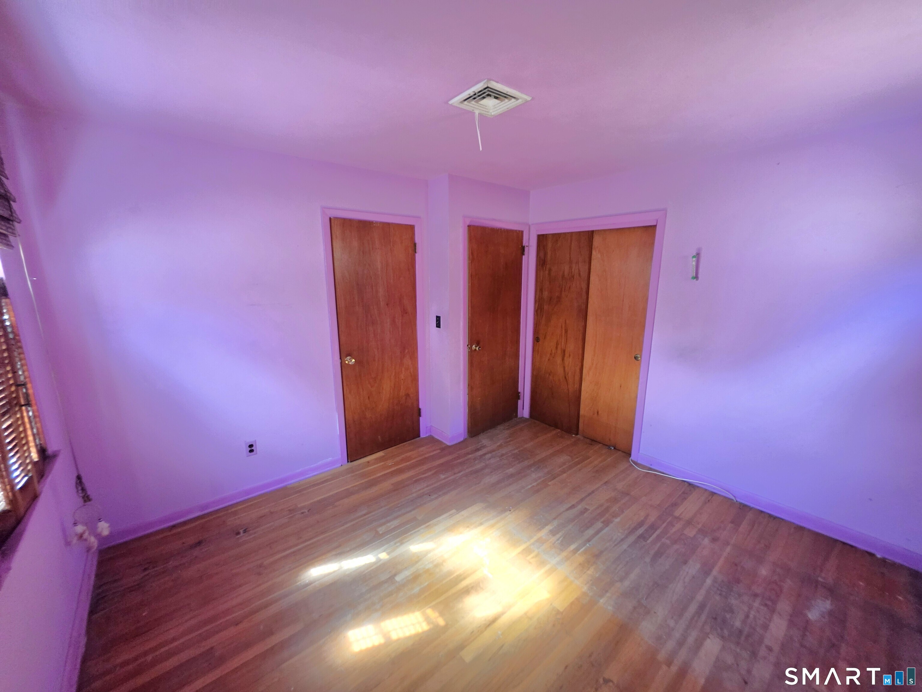 12 Brentwood Road New Milford, CT 06776 - Photo 19 of 21 a view of empty room with wooden floor and fan