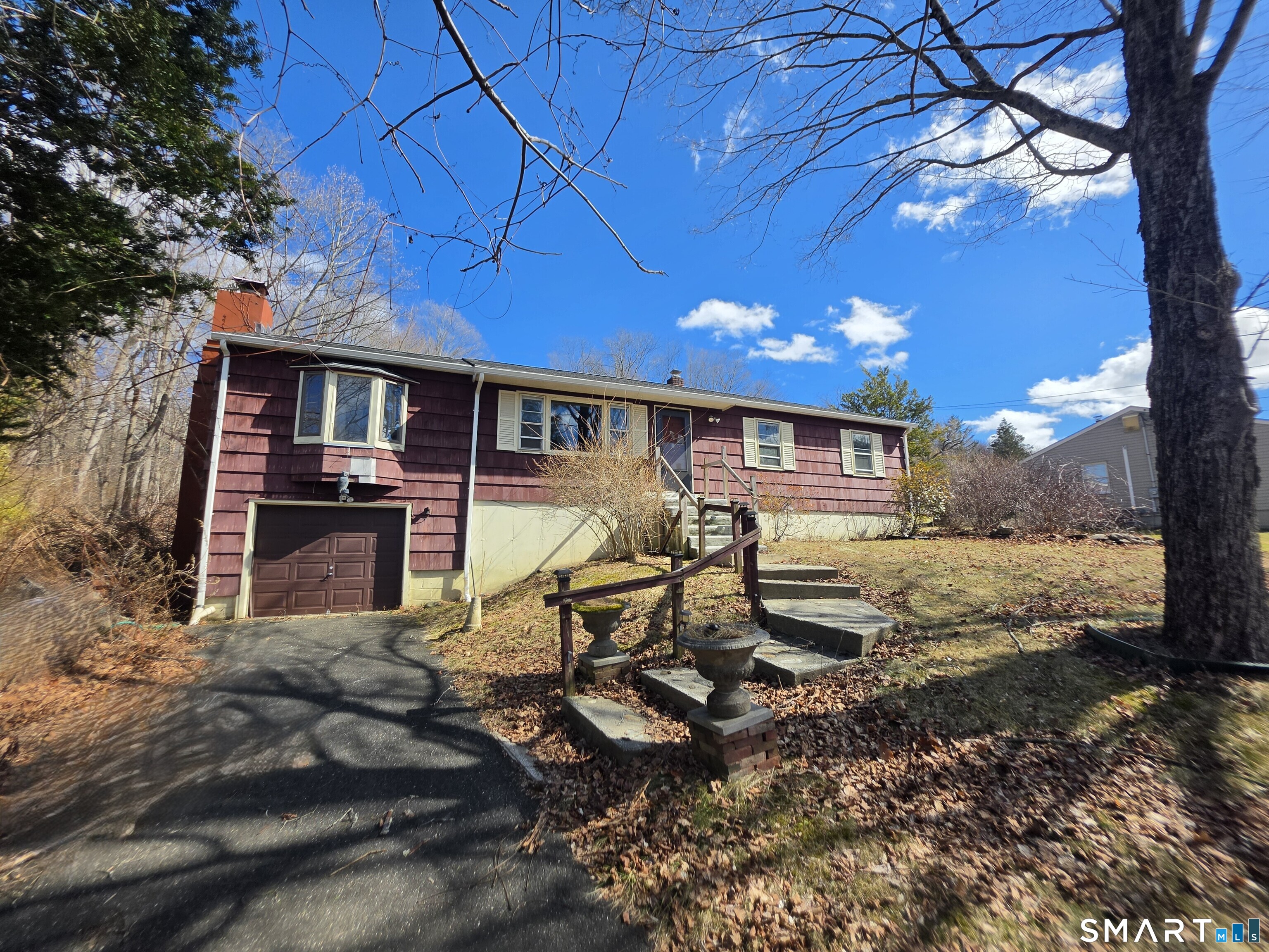 12 Brentwood Road New Milford, CT 06776 - Photo 2 of 21 a view of a house with backyard and sitting area
