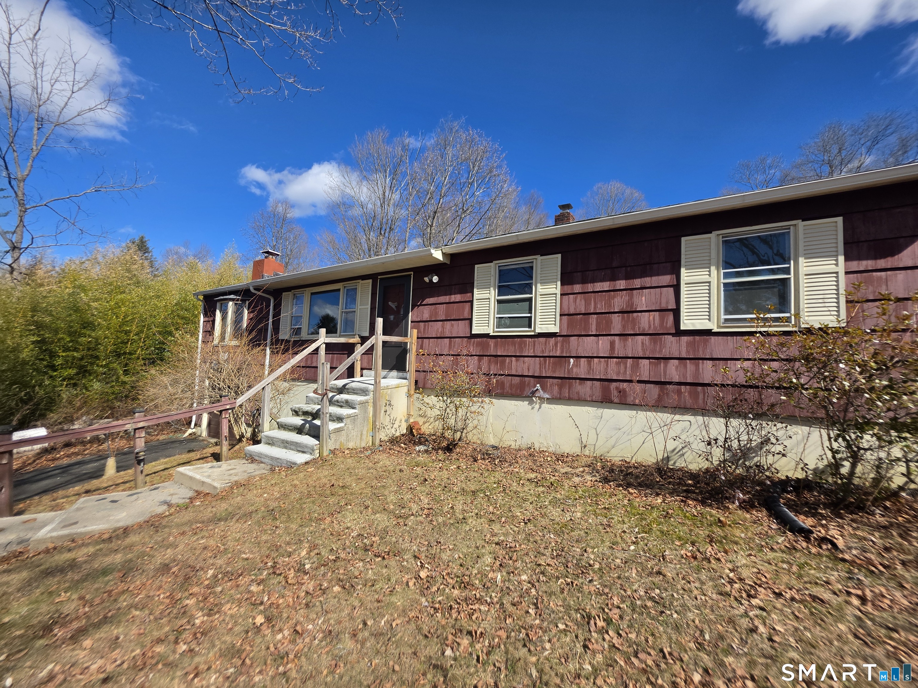 12 Brentwood Road New Milford, CT 06776 - Photo 5 of 21 a view of a house with a patio
