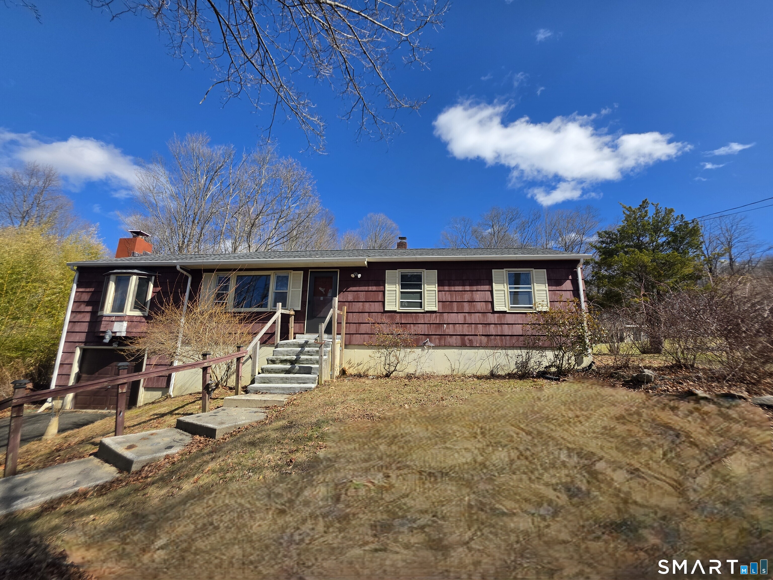 12 Brentwood Road New Milford, CT 06776 - Photo 6 of 21 a view of a house with a patio