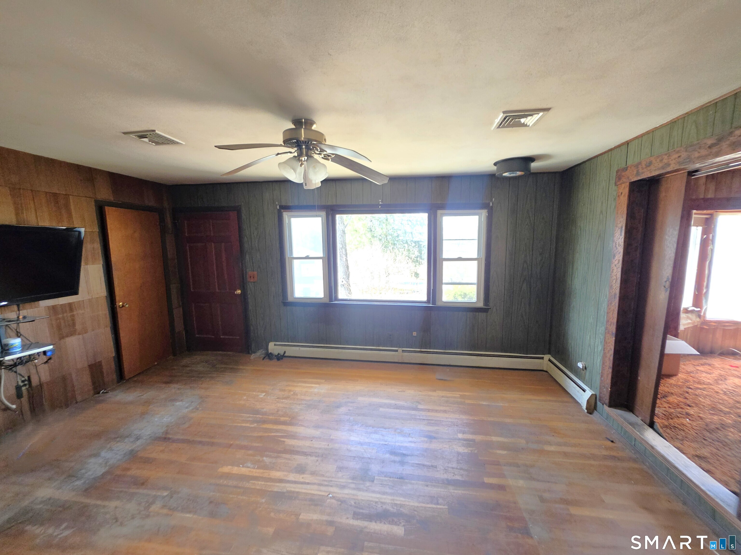 12 Brentwood Road New Milford, CT 06776 - Photo 8 of 21 a view of an empty room with a window