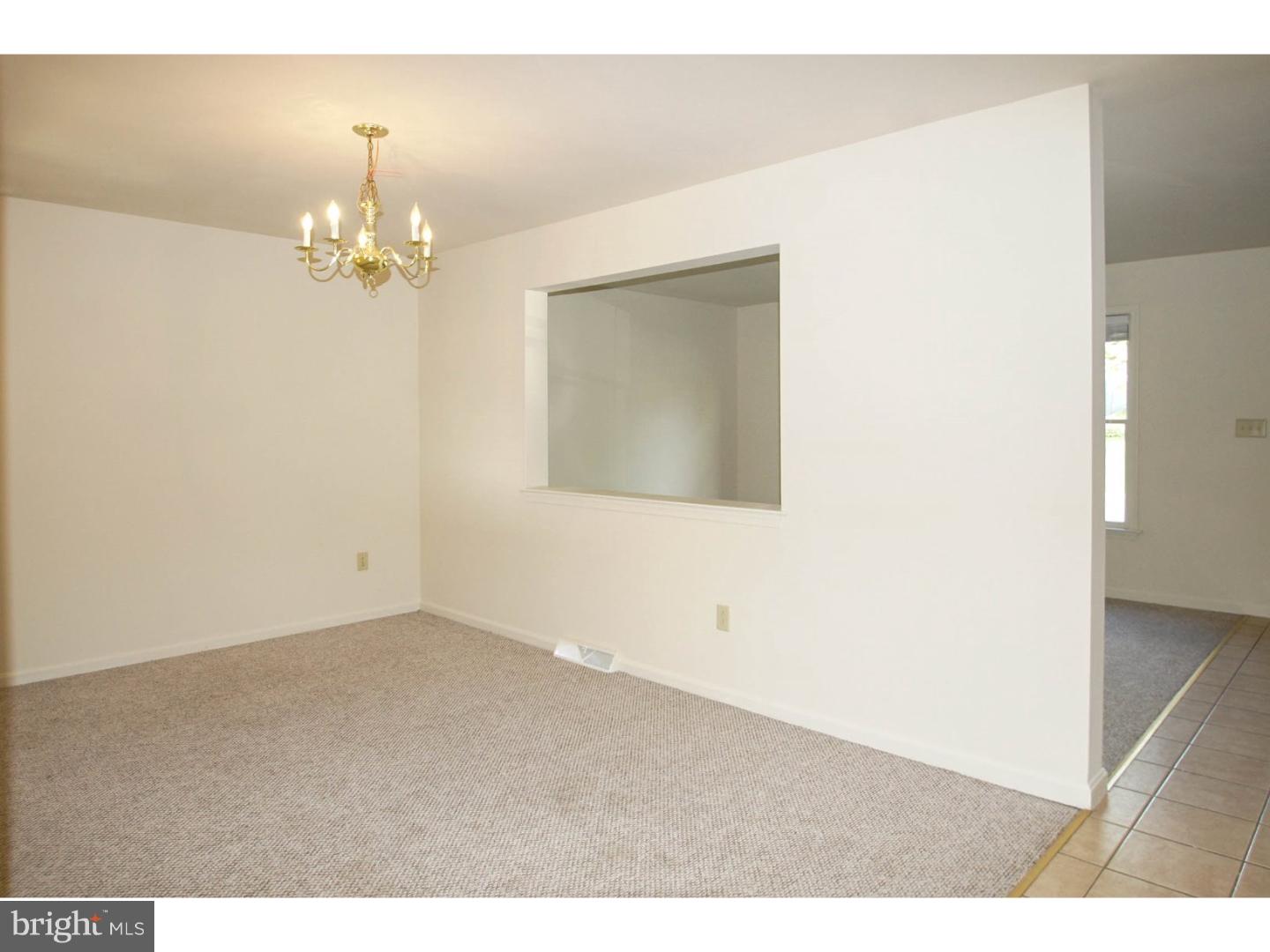 1468 Pershing Boulevard Reading, PA 19607 - Photo 4 of 15 a view of empty room with a chandelier