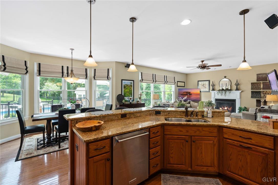 6081 Upper Ridge Road Green Lane, PA 18054 - Photo 21 of 39 a view of a kitchen with kitchen island granite countertop a sink and a large window