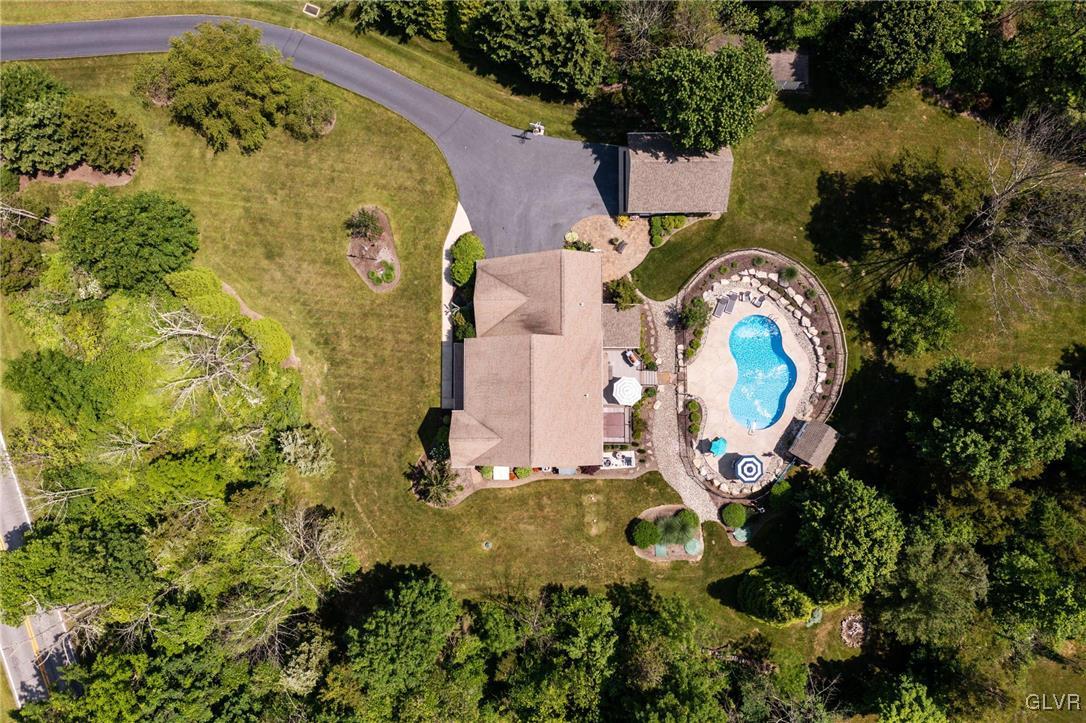 6081 Upper Ridge Road Green Lane, PA 18054 - Photo 8 of 39 an aerial view of a house with a swimming pool