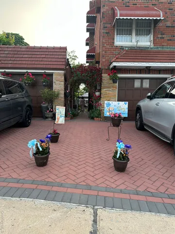 a front view of a house with a patio