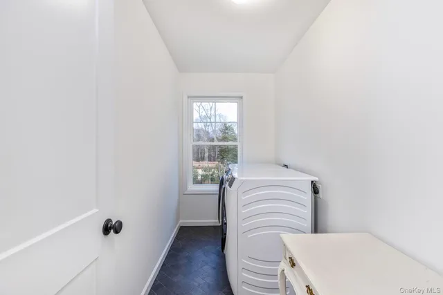 a bathroom with a sink a toilet and tub