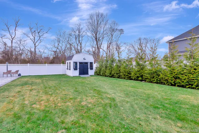 a view of a backyard with garden