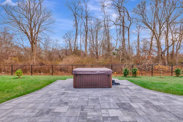 a view of backyard with green space