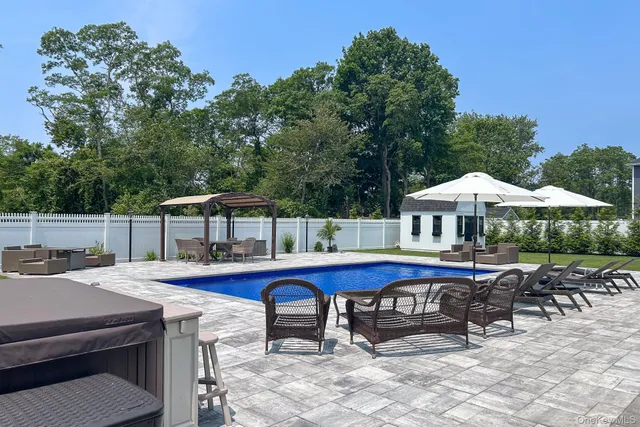 a view of a dinning table and chairs in the patio