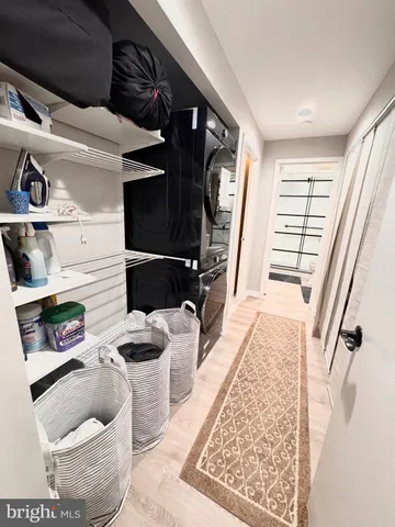 a bathroom with a sink toilet and a mirror