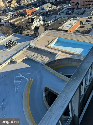 a view of swimming pool with outdoor seating