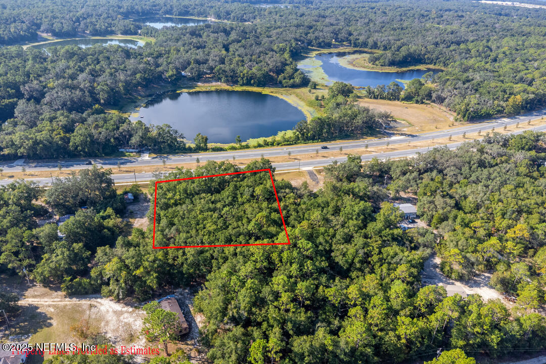 1926 Highway 20 Hawthorne, FL 32640 - Photo 5 of 13 a view of a lake and outdoor space