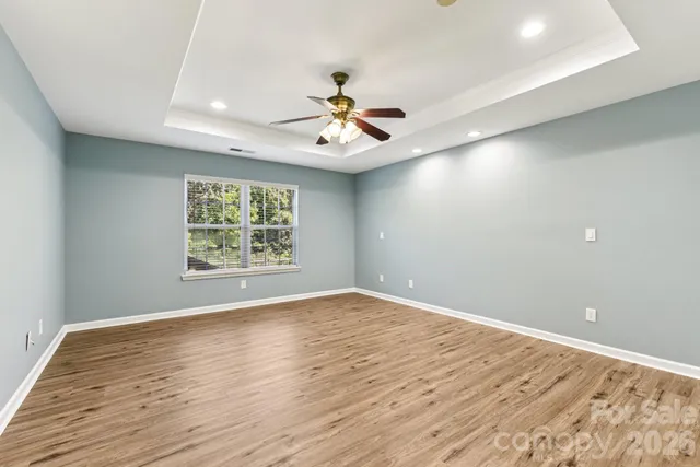 a view of a backyard with white house