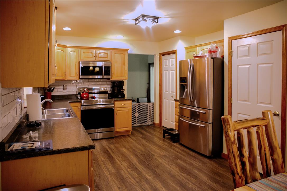 50 Anthony's Road White Haven, PA 18661 - Photo 19 of 57 a kitchen with stainless steel appliances a refrigerator and a stove top oven