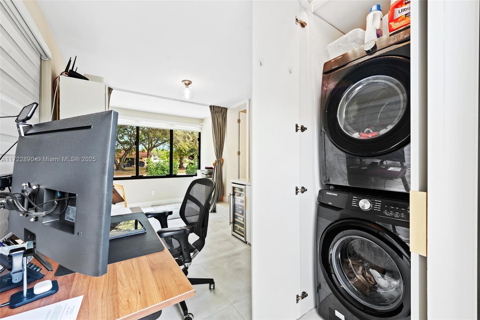 620 Cardinal Street Miami Springs, FL 33166 - Photo 20 of 24 a view of a living room washer and dryer