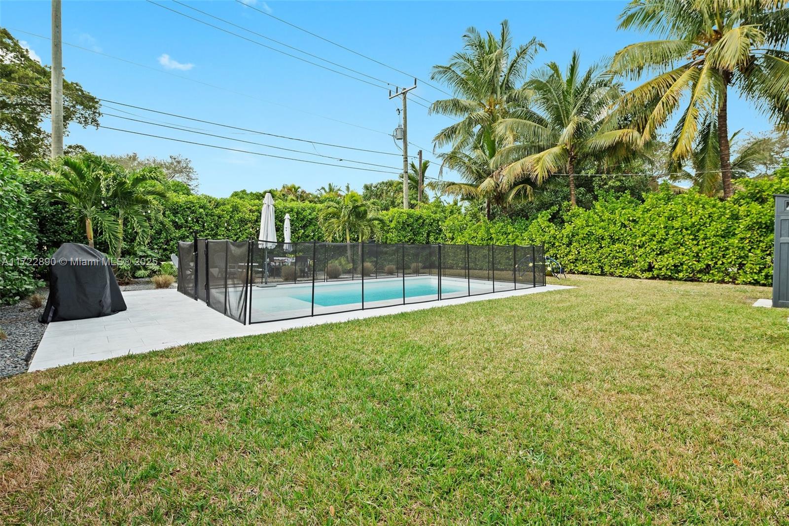 620 Cardinal Street Miami Springs, FL 33166 - Photo 22 of 24 a view of a garden