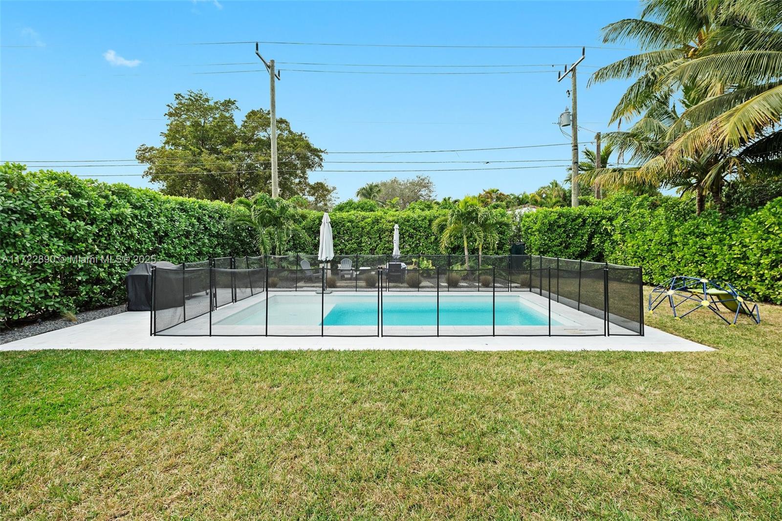 620 Cardinal Street Miami Springs, FL 33166 - Photo 23 of 24 a view of a backyard