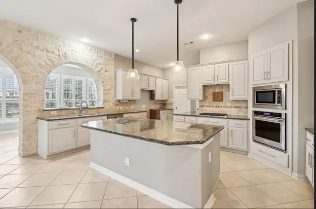 a view of a livingroom with furniture and wooden floor