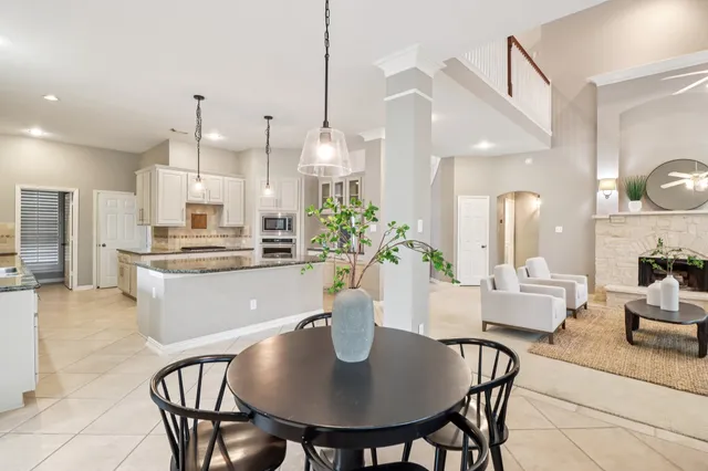 a view of a dining room with furniture