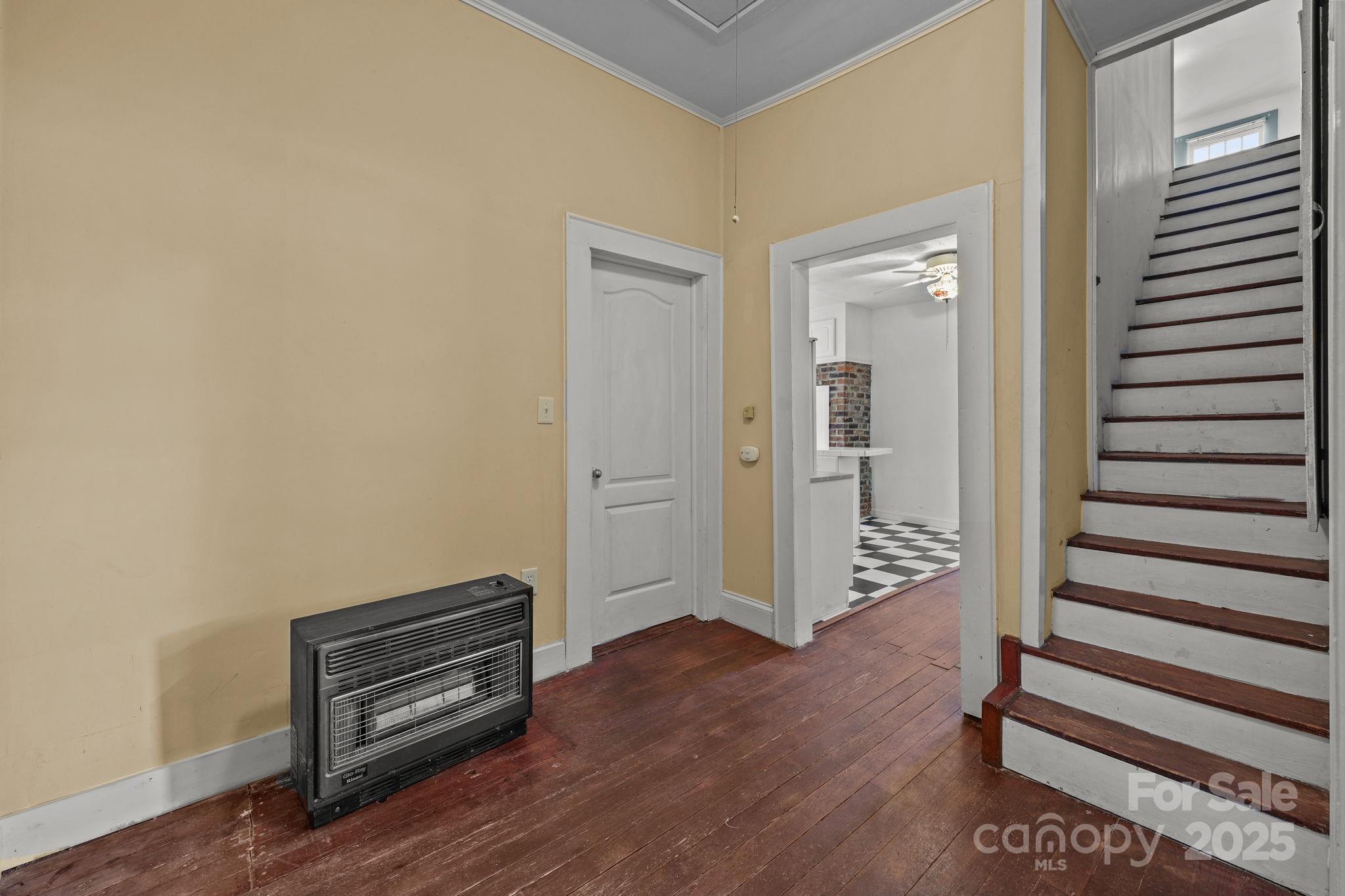 123 North Main Street Salisbury, NC 28144 - Photo 24 of 47 an empty room with wooden floor