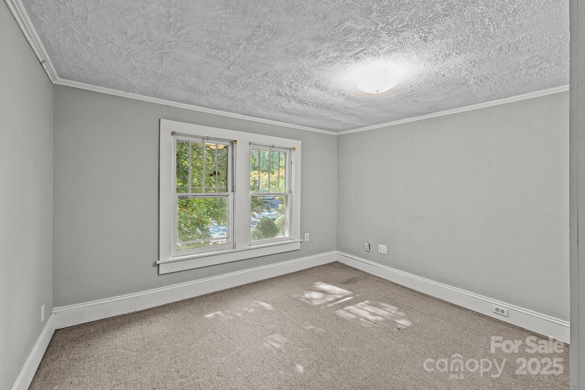 123 North Main Street Salisbury, NC 28144 - Photo 29 of 47 an empty room with a window