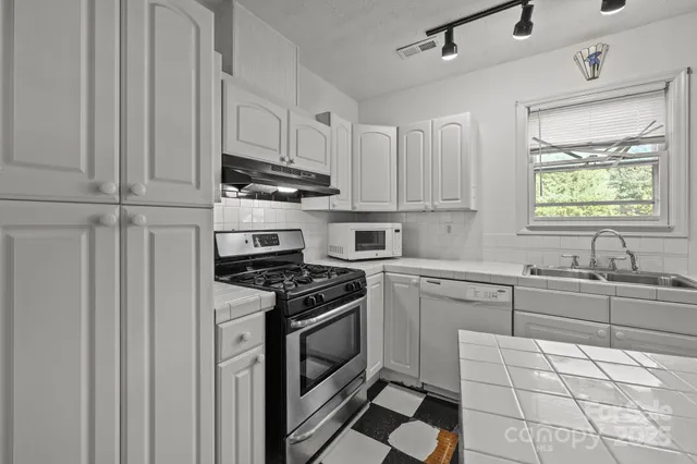 a very nice looking dining room with a rug