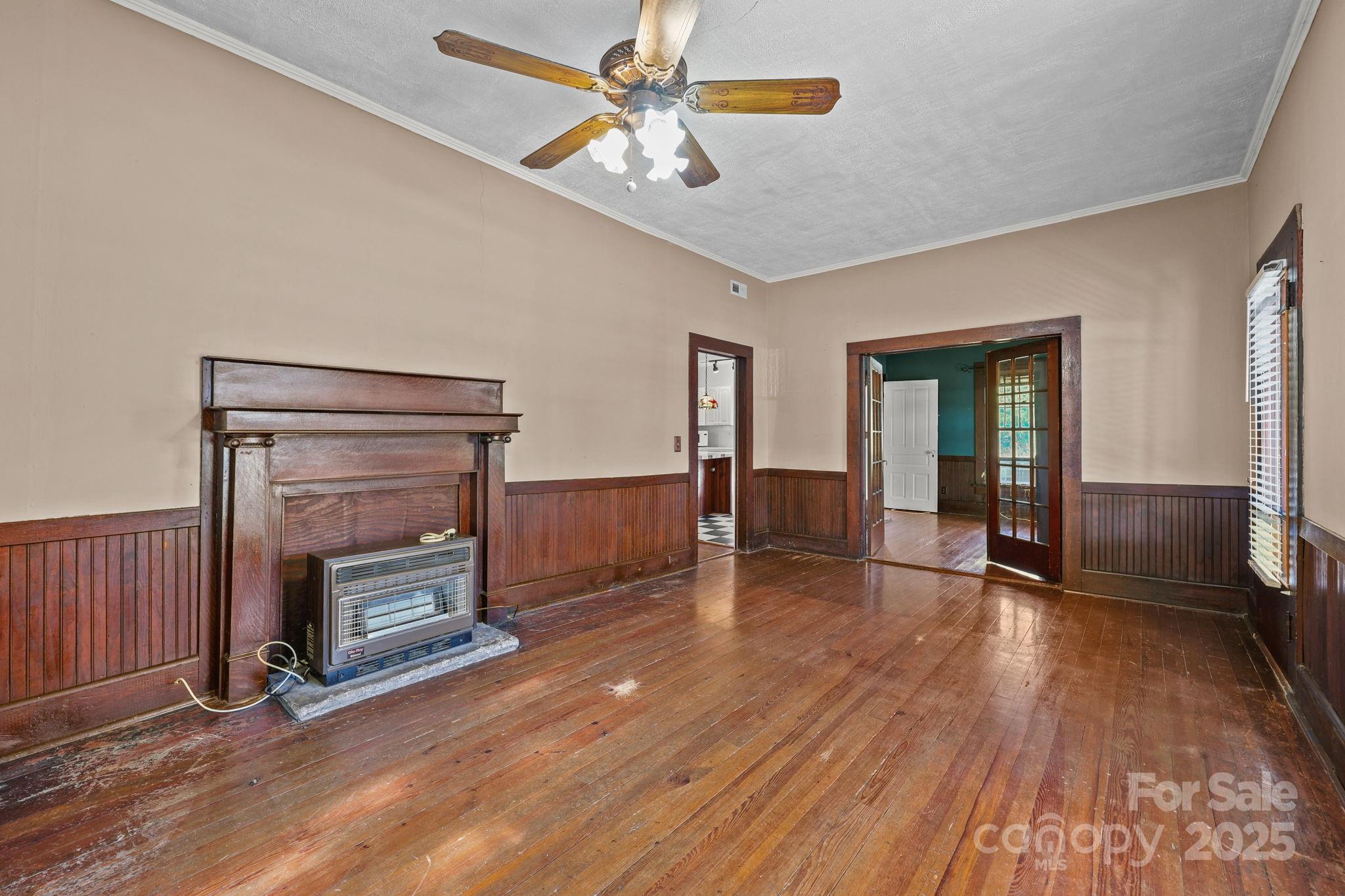123 North Main Street Salisbury, NC 28144 - Photo 8 of 47 a view of livingroom with hardwood floor and a ceiling fan