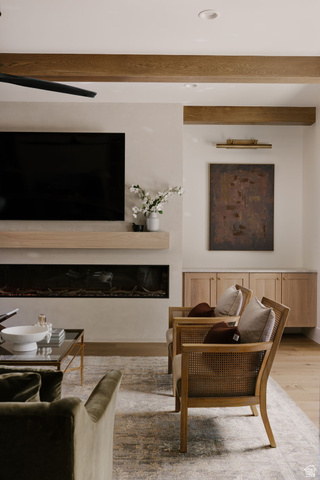 2281 South Crimson Cliffs Way St. George, UT 84790 - Photo 22 of 47 Living room with wood finished floors and beam ceiling