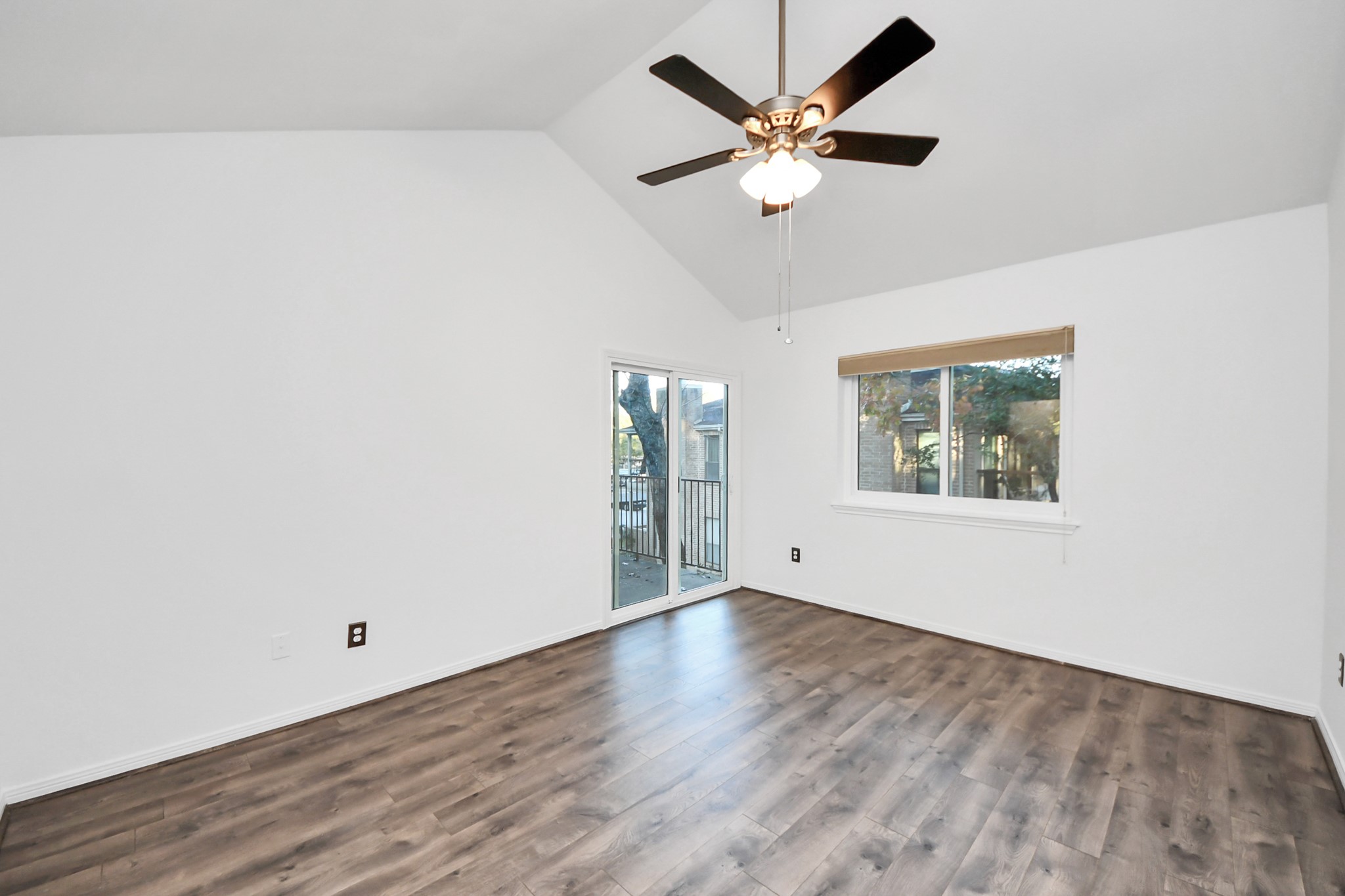 3500 Tangle Brush Drive, Unit 186 Spring, TX 77381 - Photo 35 of 43 an empty room with wooden floor and ceiling fan