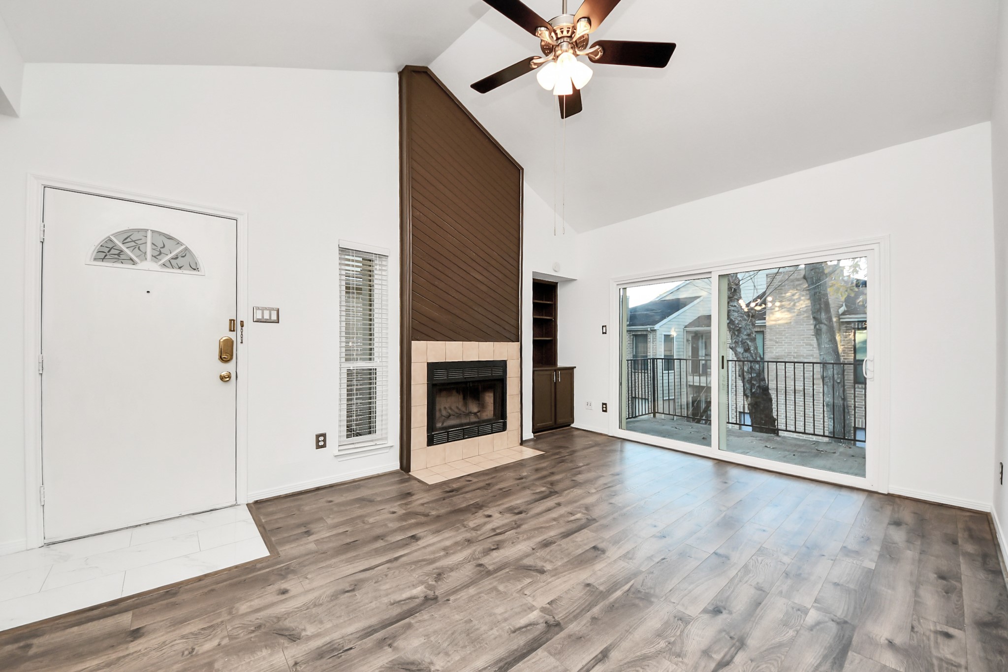3500 Tangle Brush Drive, Unit 186 Spring, TX 77381 - Photo 9 of 43 a view of a livingroom with a fireplace and window