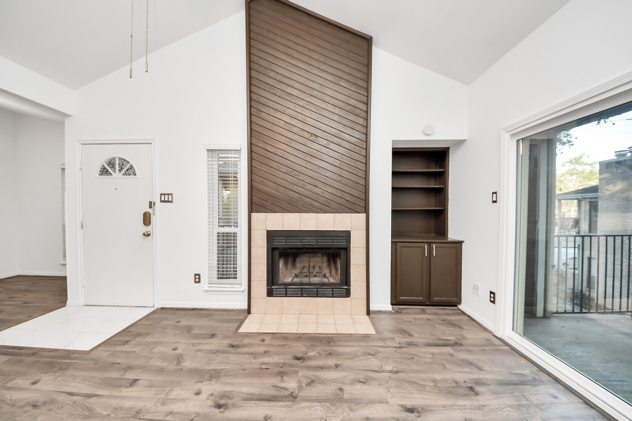 3500 Tangle Brush Drive, Unit 186 Spring, TX 77381 - Photo 10 of 43 a view of a livingroom with a fireplace and window