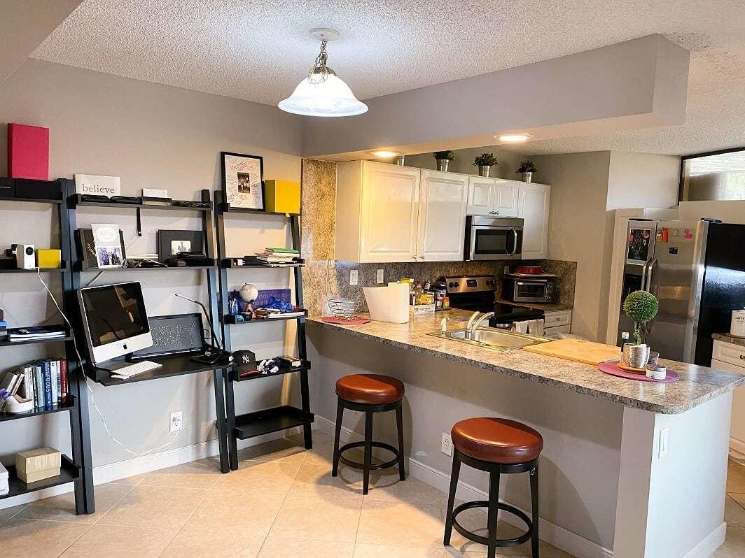 8361 Trent Court, Unit A Boca Raton, FL 33433 - Photo 6 of 13 Townhouse kitchen