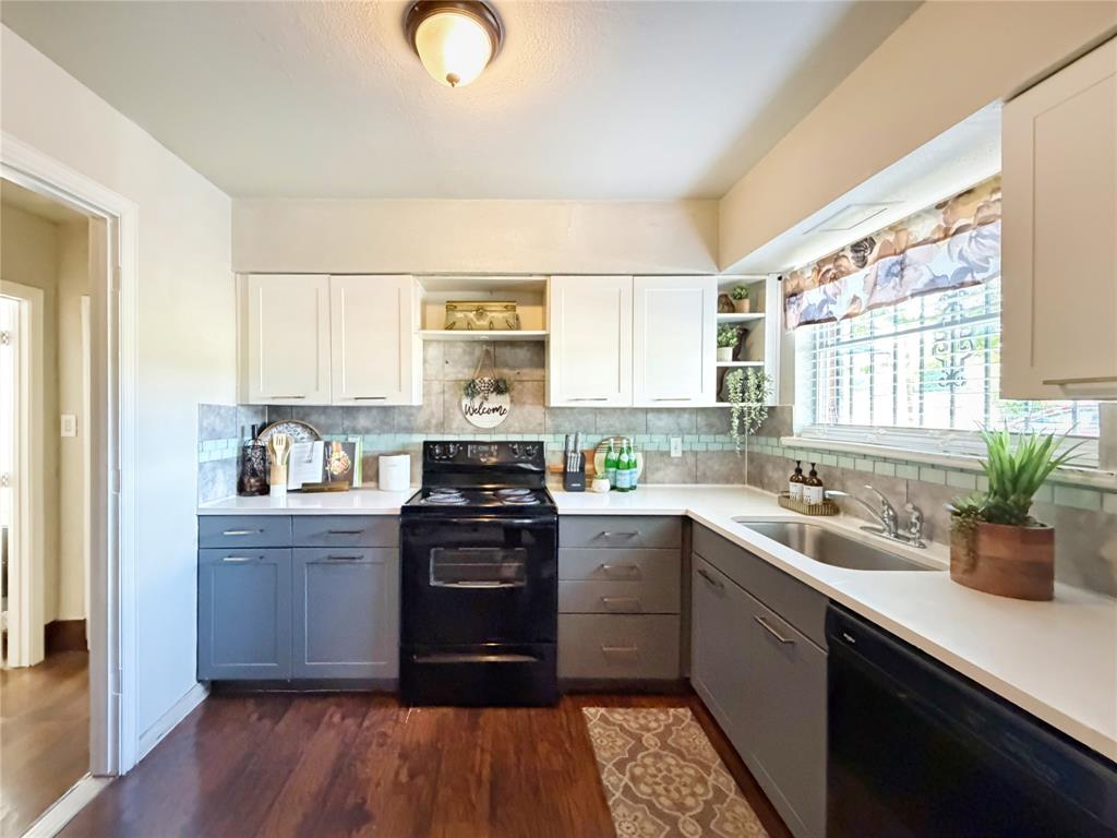 2243 Inca Drive Dallas, TX 75216 - Photo 7 of 24 Stylish backsplash and marble countertops are a chef's dream.