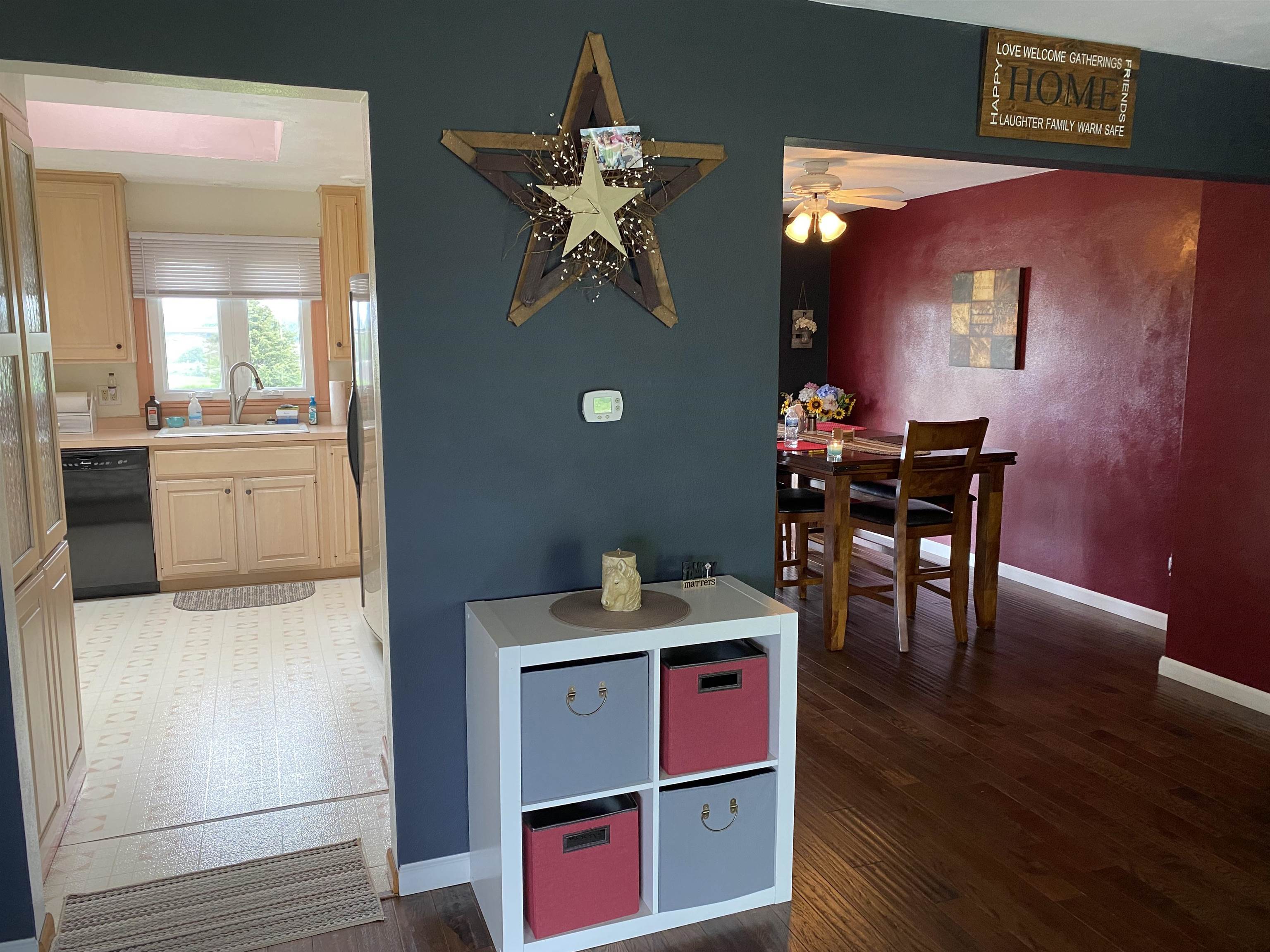 4482 East Lamm Road Freeport, IL 61032 - Photo 10 of 47 a room with furniture a dining table and a painting on the wall