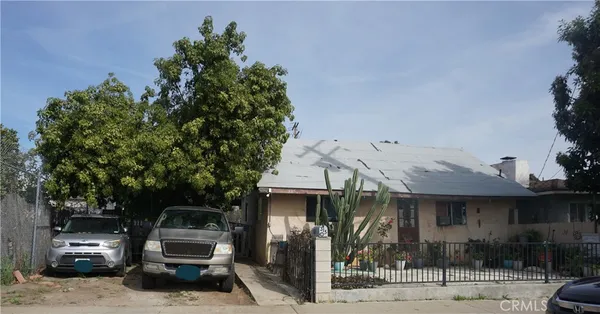 a car parked in front of a house