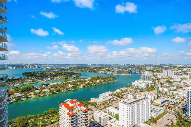 a view of a lake with a city