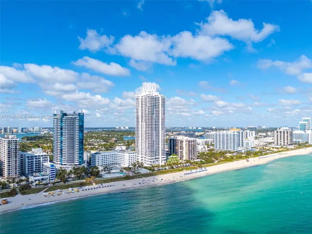 a view of a city with tall buildings