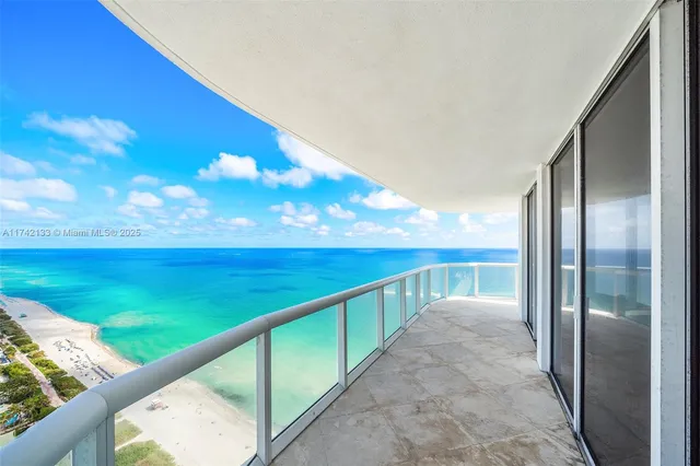 a view of balcony with ocean
