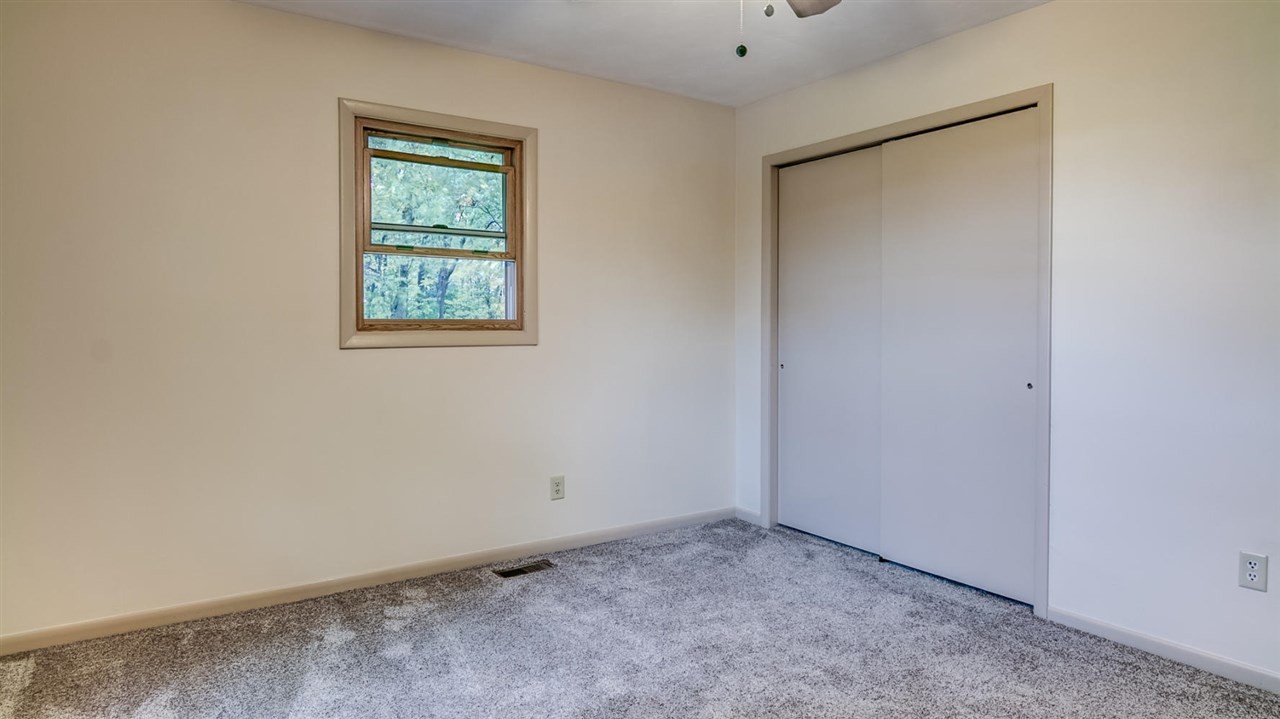 34477 Wheeler Road Kirkland, IL 60146 - Photo 13 of 25 an empty room with a window