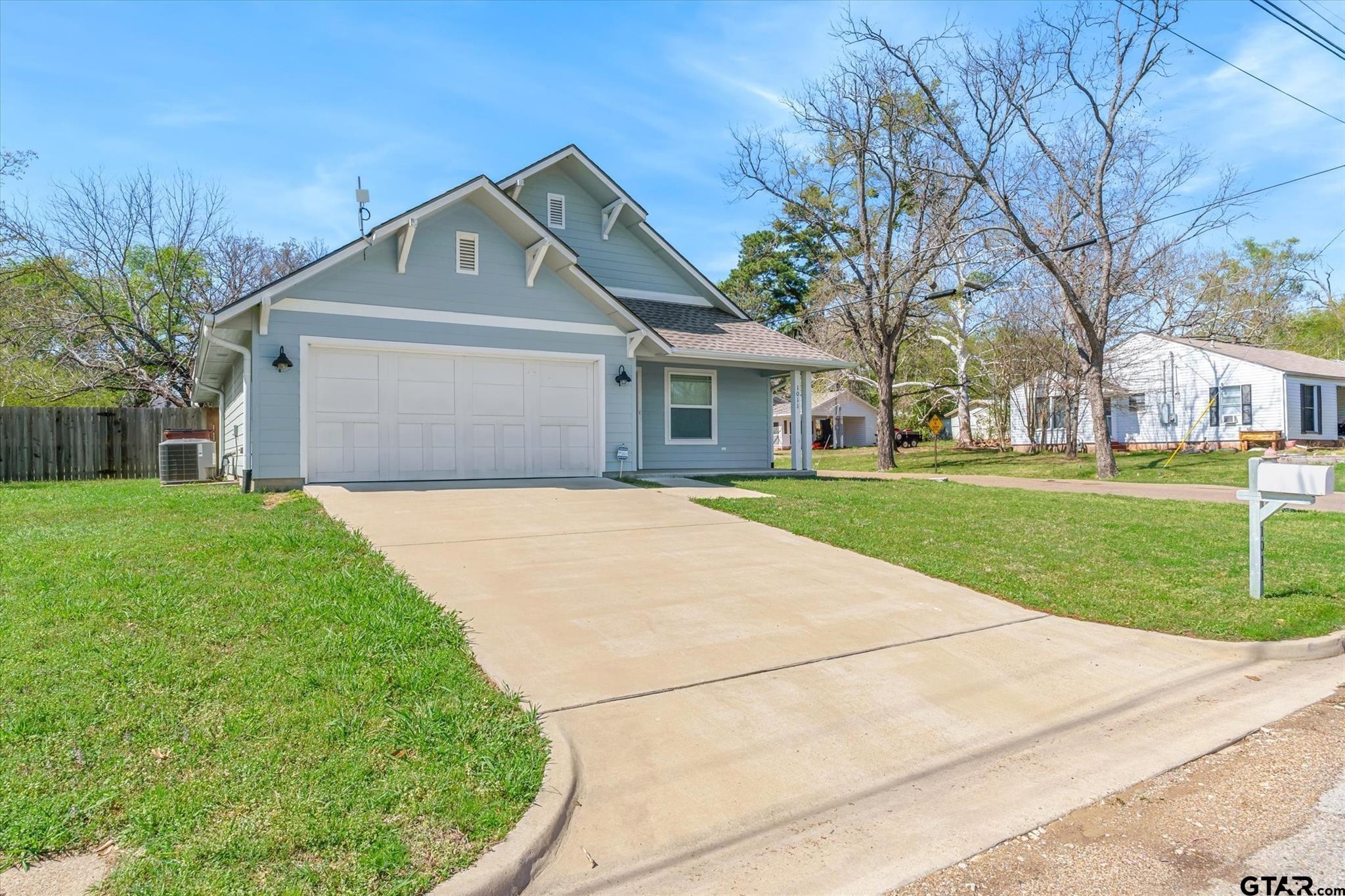 1011 Athens Street Canton, TX 75103 - Photo 2 of 38 a front view of house with yard and green space
