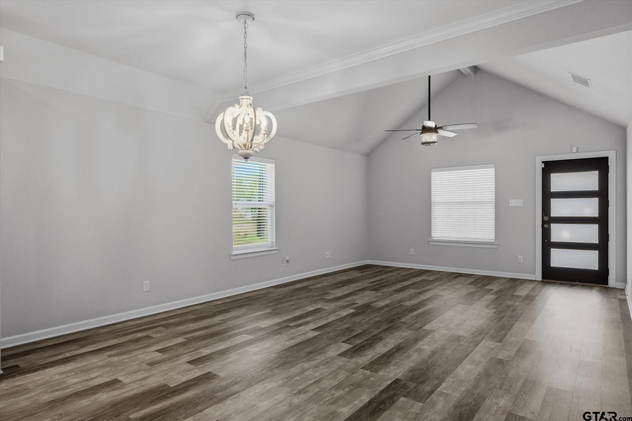 1011 Athens Street Canton, TX 75103 - Photo 6 of 38 a view of room with window and wooden floor