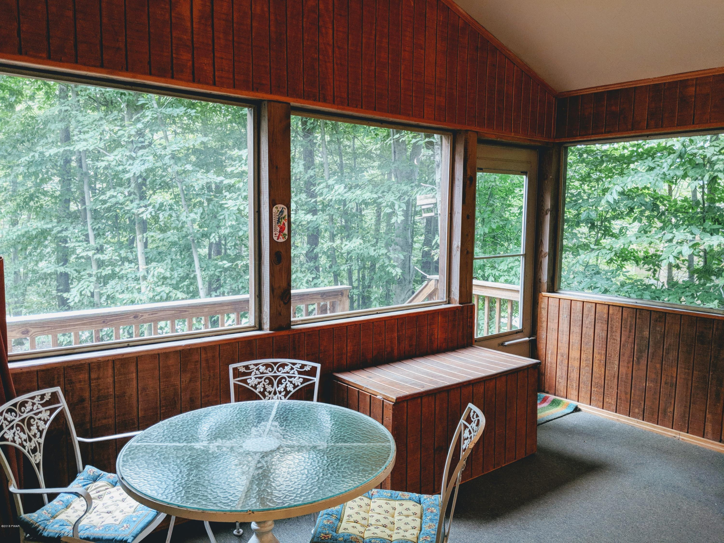 2653 Boulder Road Lake Ariel, PA 18436 - Photo 11 of 45 a view of a patio with a table chairs and a backyard