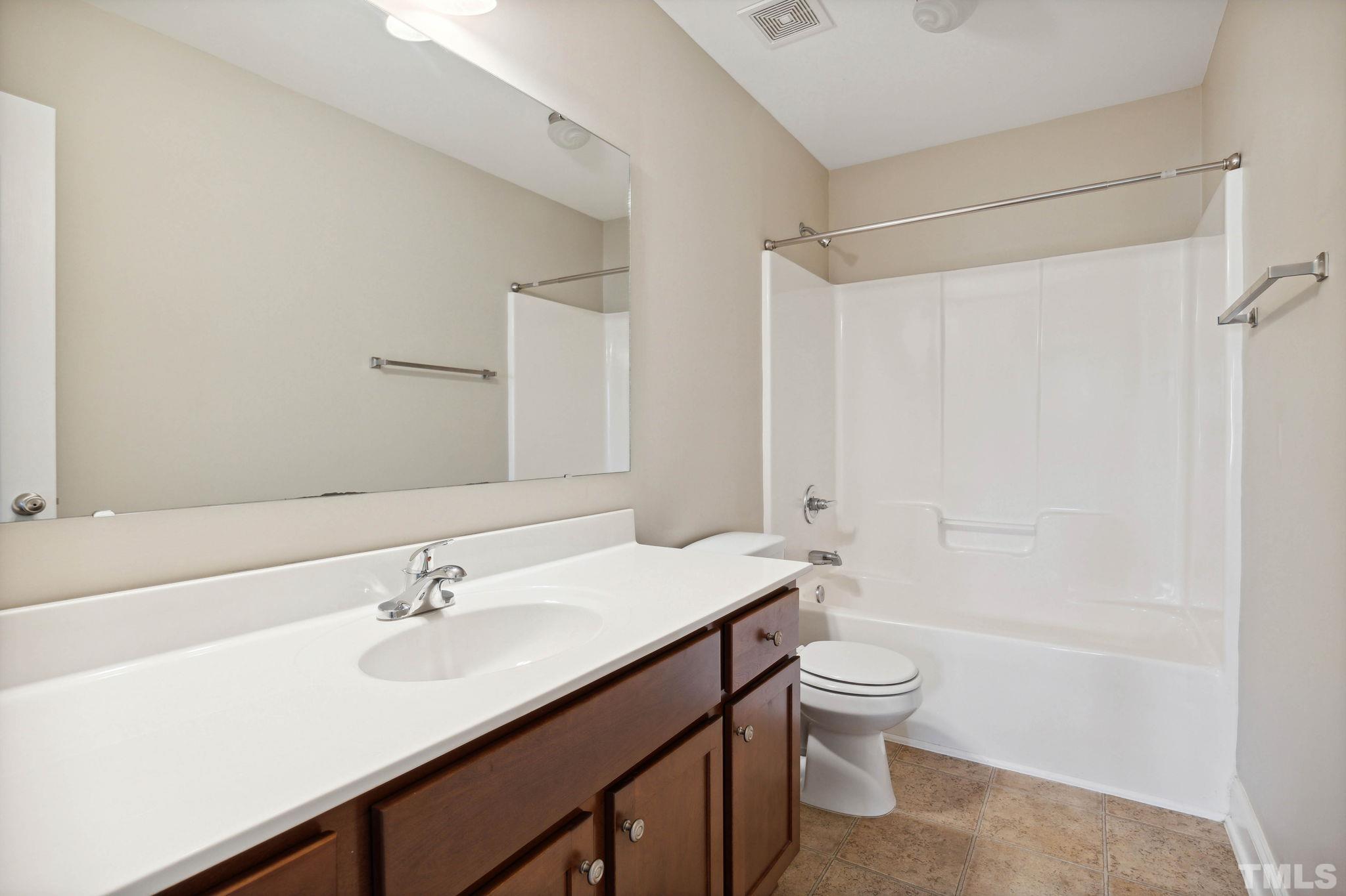 108 Riley Lane Cameron, NC 28326 - Photo 15 of 29 a bathroom with a sink a toilet and shower