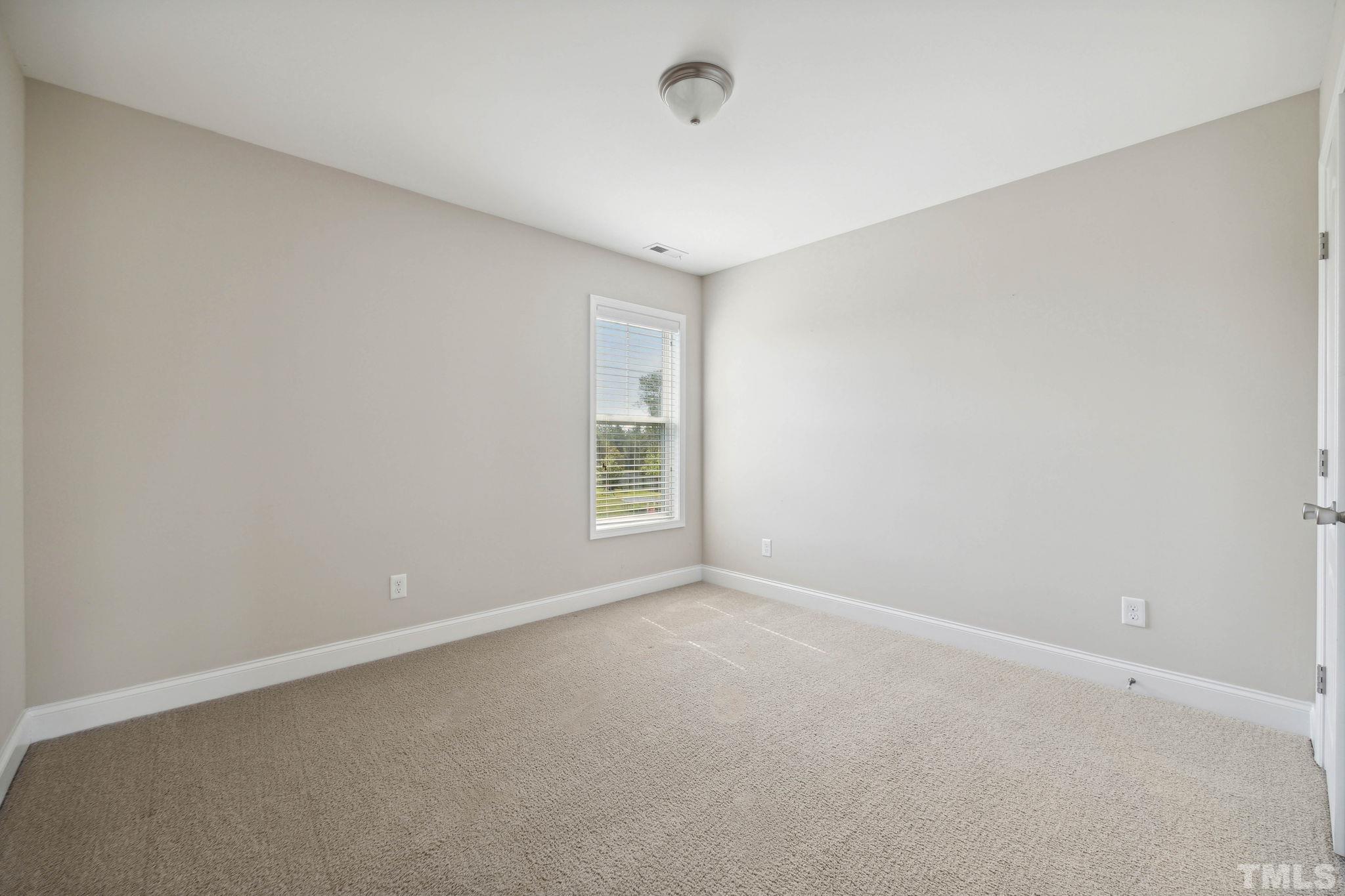 108 Riley Lane Cameron, NC 28326 - Photo 16 of 29 a view of an empty room with a window